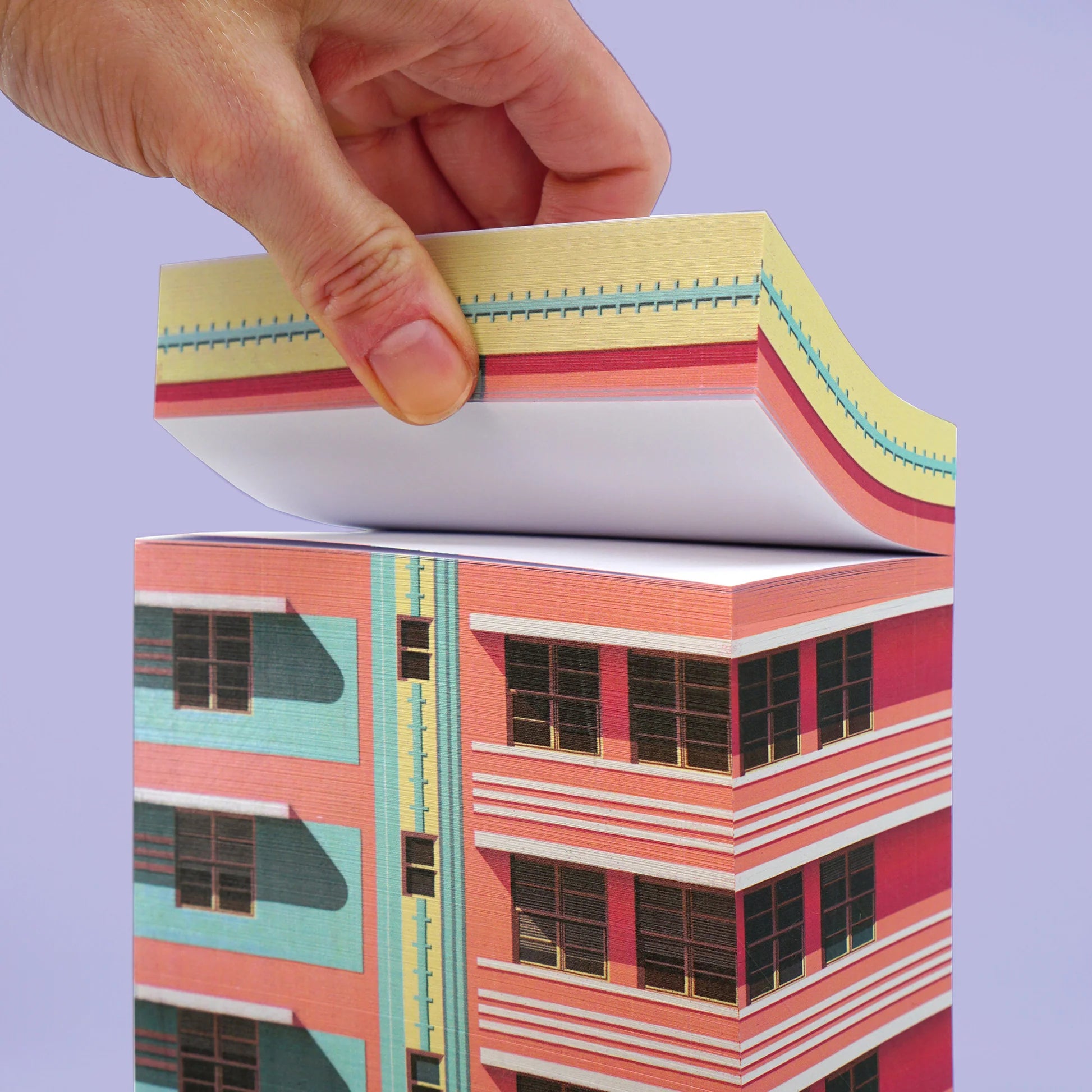 Paperscraper Miami│Memoblok│met hand met bovenste deel vastgepakt