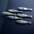 Blue Herring Peacock Scales│Royal Delft│art. 46502600│alle varianten in school vorm naast elkaar