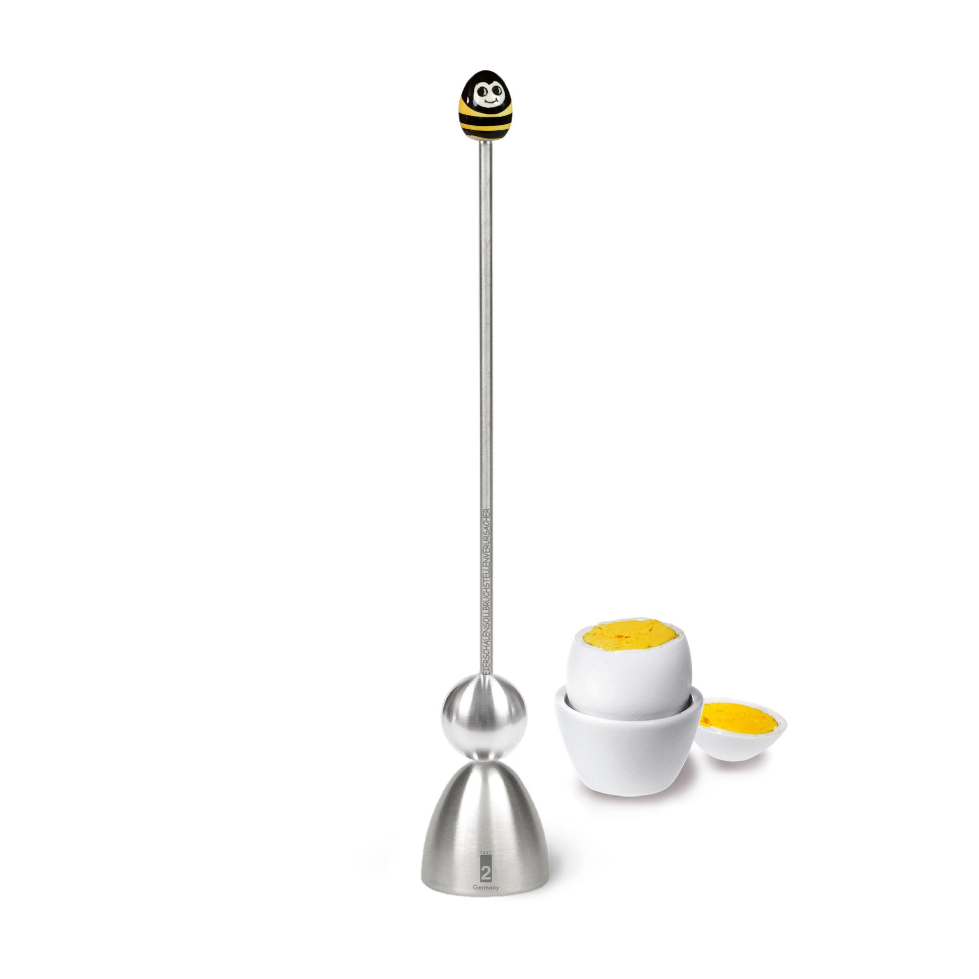 Clack Ei-Opener Bij│Take2-design│art. 99004/19│vooraanzicht met gekookt ei op achtergrond