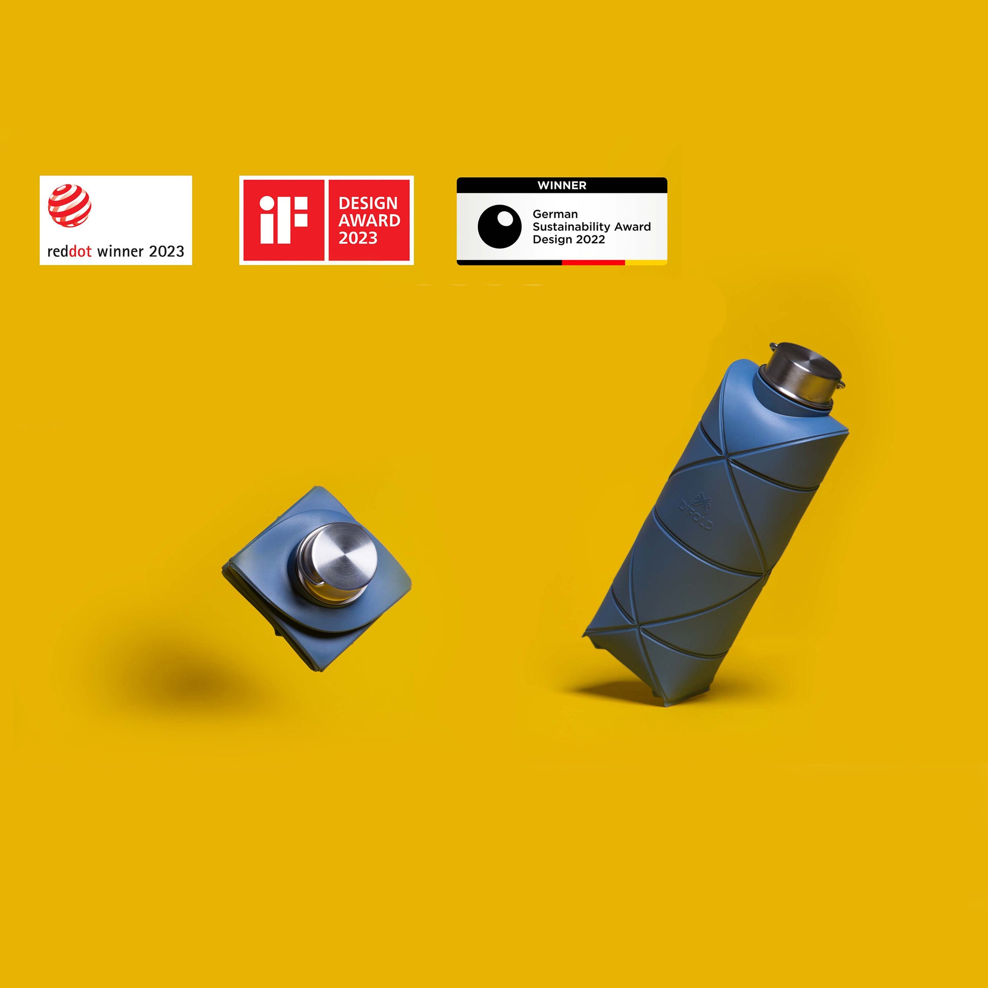 Difold Origami Waterfles Sleek Bue│art. DFOB25/750GSLBL│gele achtergrond met logo's van awards