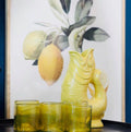 Gluckigluck Waterkaraf Vis SunSun│art. G31155/SUN/W│op tafel voor schilderij