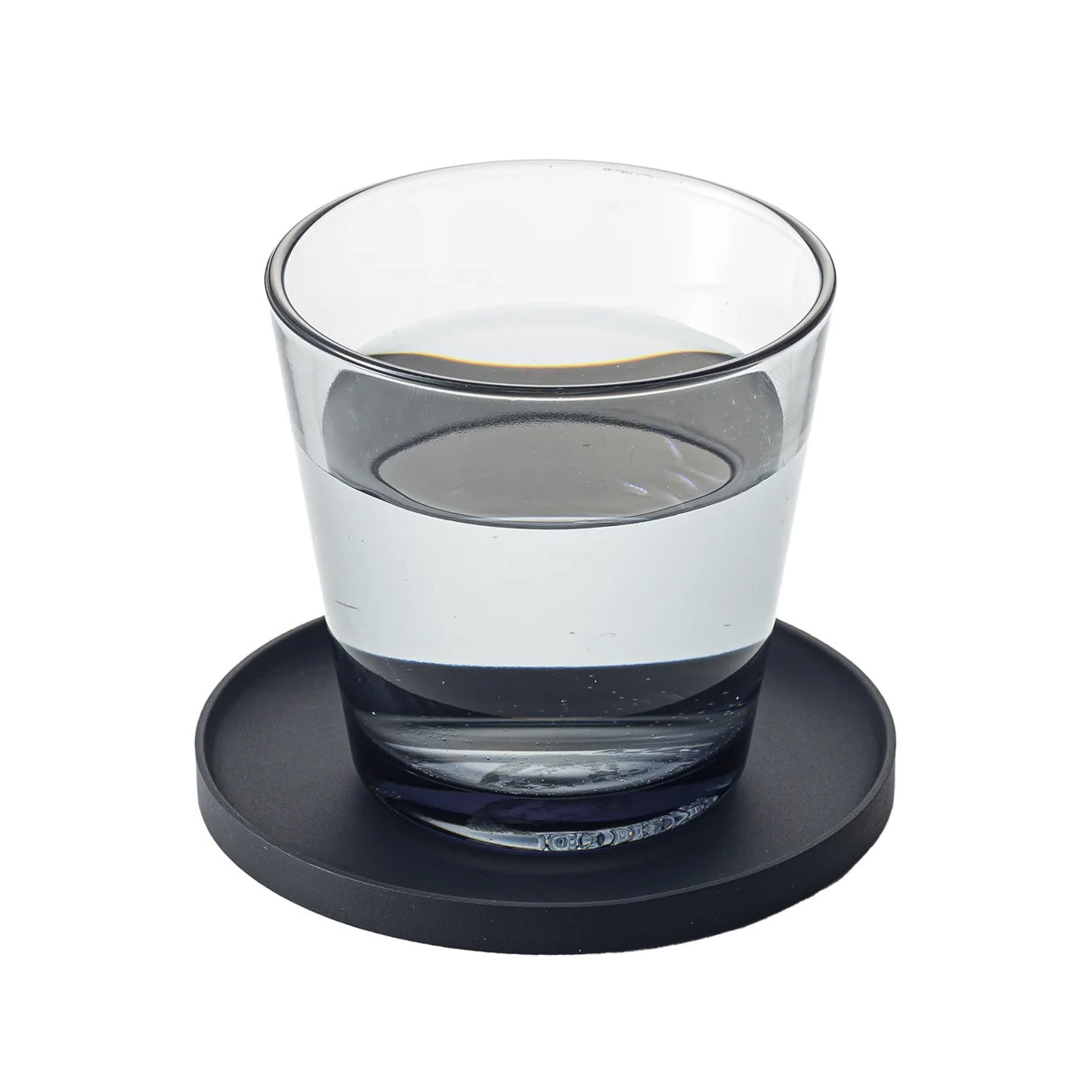 Tower onderzetter Siliconen Zwart│Yamazaki│art. 025393│met waterglas en witte achtergrond