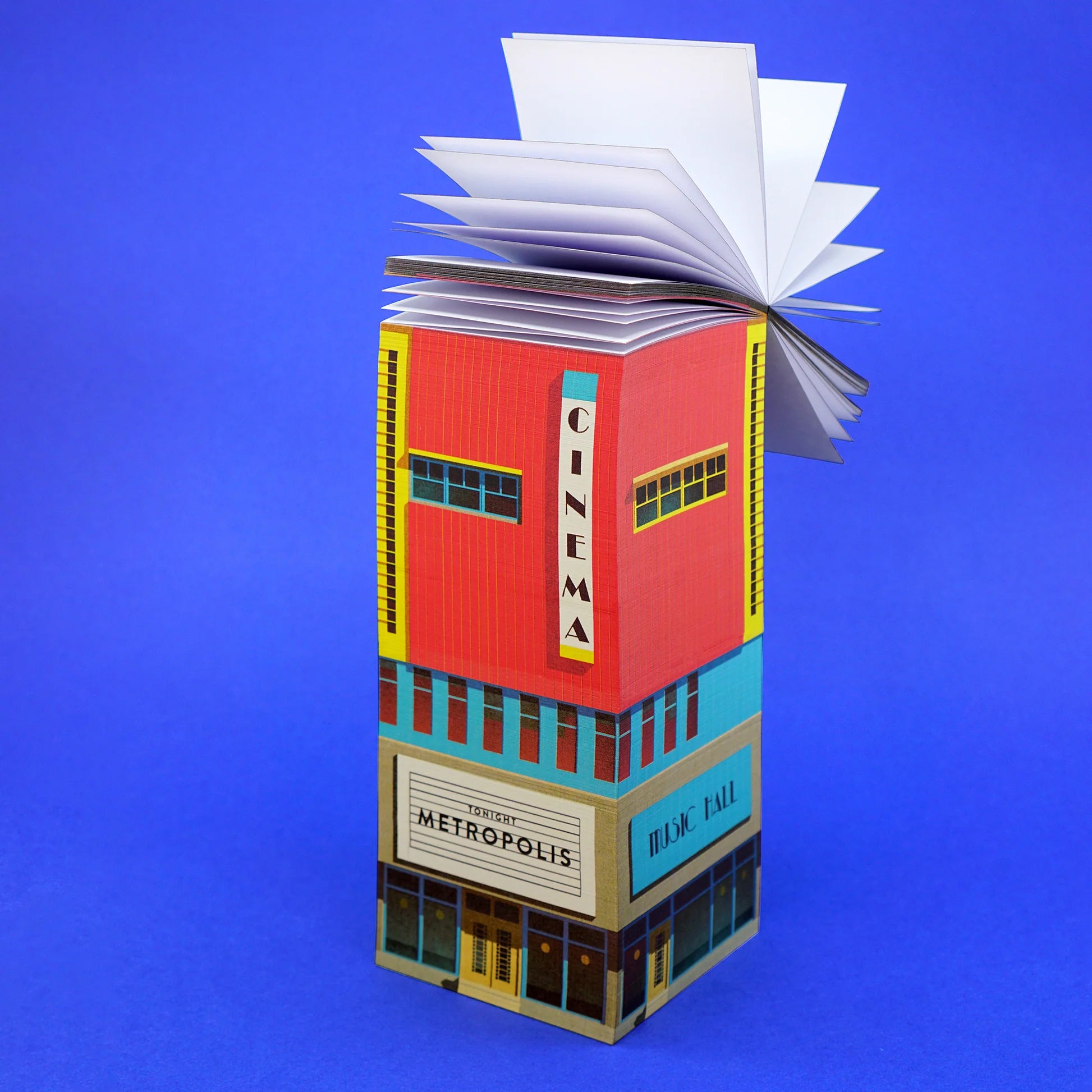 Paperscraper Cinema│Memoblok│bovenste vellen papaier loswaaiend