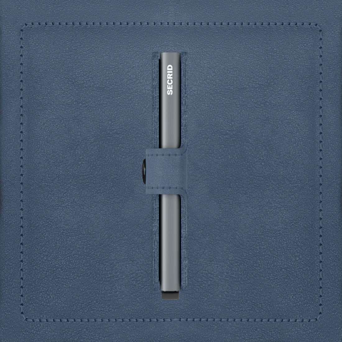 Secrid Miniwallet Original│art. M-ICE BLUE│Pasjeshouder en Portemonnee│zijkant met leersoort op achtergrond