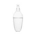 Tap Water Carafe Dune Borosilicaatglas│Vij5│vooraanzicht met waterfles half gevuld