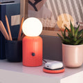 Original Lamp Coral│Lund London│Oplaadbaar│art. 7471│met licht aan en oordopjes op draadloze oplader