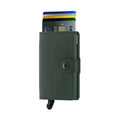 Secrid Miniwallet Original│art. M-GREEN│Pasjeshouder en Portemonnee│voorkant met uitgeschoven kaarten en clip