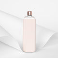 Memobottle Silicone Sleeve Slim Pale Coral│Drinkfles│foto met papier op achtergrond