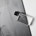 Memobottle A7│Platte Waterfles 180ml│art. M005R│liggend op leisteen