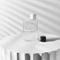 Memobottle A7│Platte Waterfles 180ml│art. M005R│op ronde blok met witte en zwarte dop