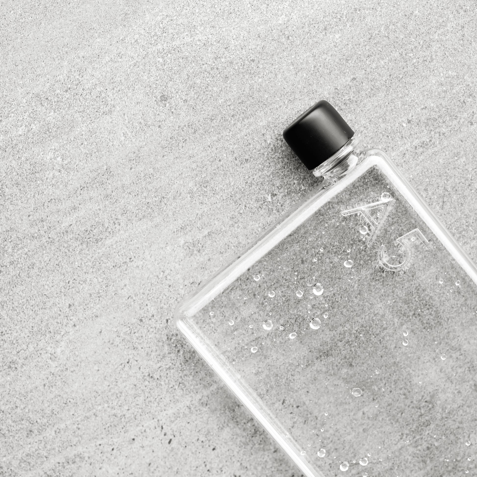 Memobottle A5│Platte Waterfles 750 ml│foto op stenen ondergrond