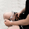 Memobottle A5│Platte Waterfles 750 ml│art. M002R│in hand van sporter