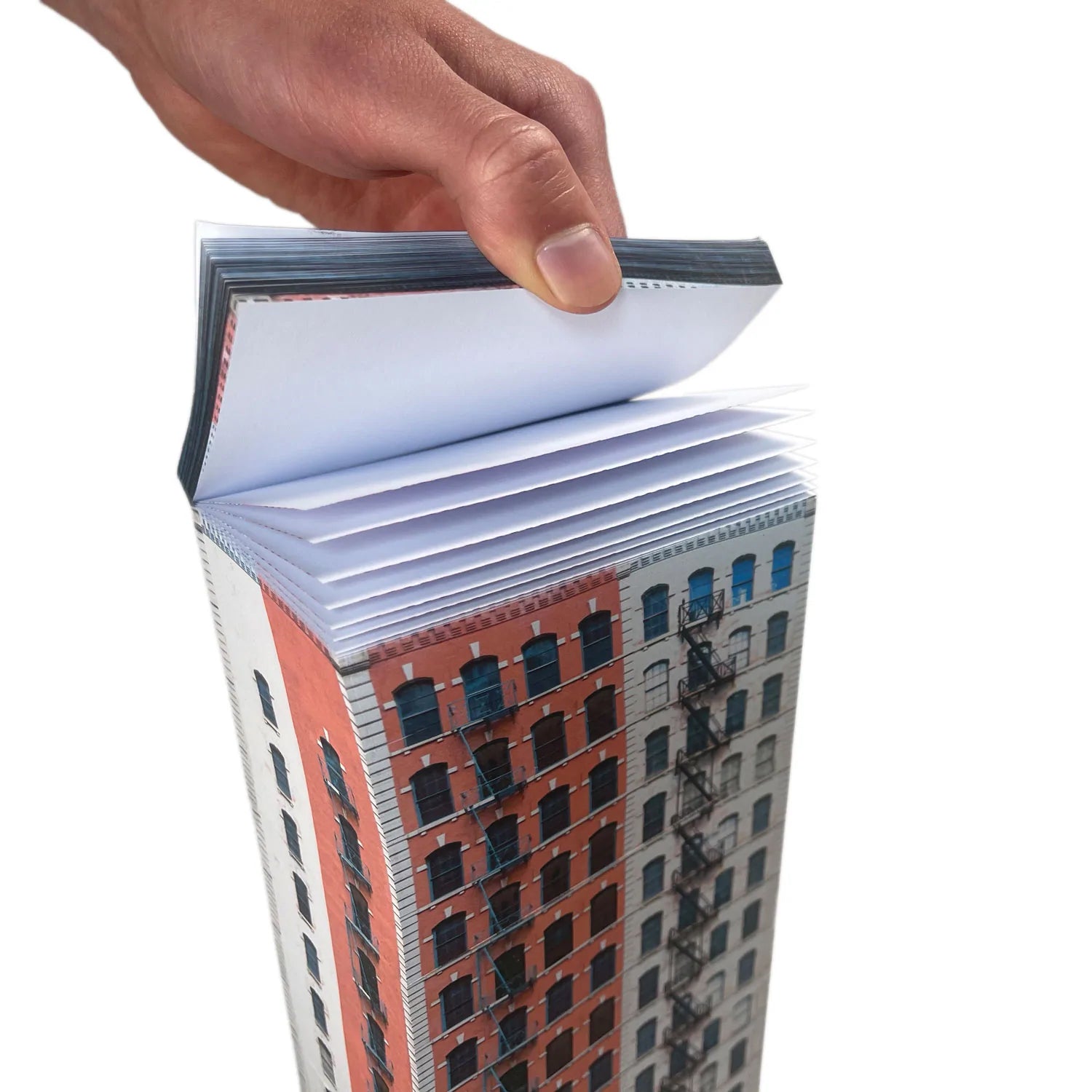 Memoblok Paperscraper Townhouse Soho│Seltmann Publishers│bovenkant met hand aan losse blaadjes