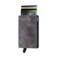 Secrid Slimwallet Vintage│art. SV-GREY-BLACK│Pasjeshouder│voorkant met uitgeschoven pasjes en clip