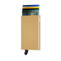 Secrid Cardprotector│art. C-GOLD│Pasjeshouder│voorkant met uitgeschoven pasjes en clip