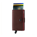 Secrid Miniwallet Metallic│art. MME-MORO│Pasjeshouder│voorkant met uitgeschoven pasjes en clip