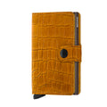 Secrid Miniwallet Cleo│art. MCL-OCHRE-BROWN│Pasjeshouder│voorkant met witte achtergrond