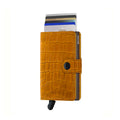 Secrid Miniwallet Cleo│art. MCL-OCHRE-BROWN│Pasjeshouder│voorkant met uitgeschoven pasjes