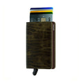 Secrid Slimwallet Dutch Martin│Pasjeshouder│art. SDM-OLIVE│voorkant met uitgeschoven pasjes en clip