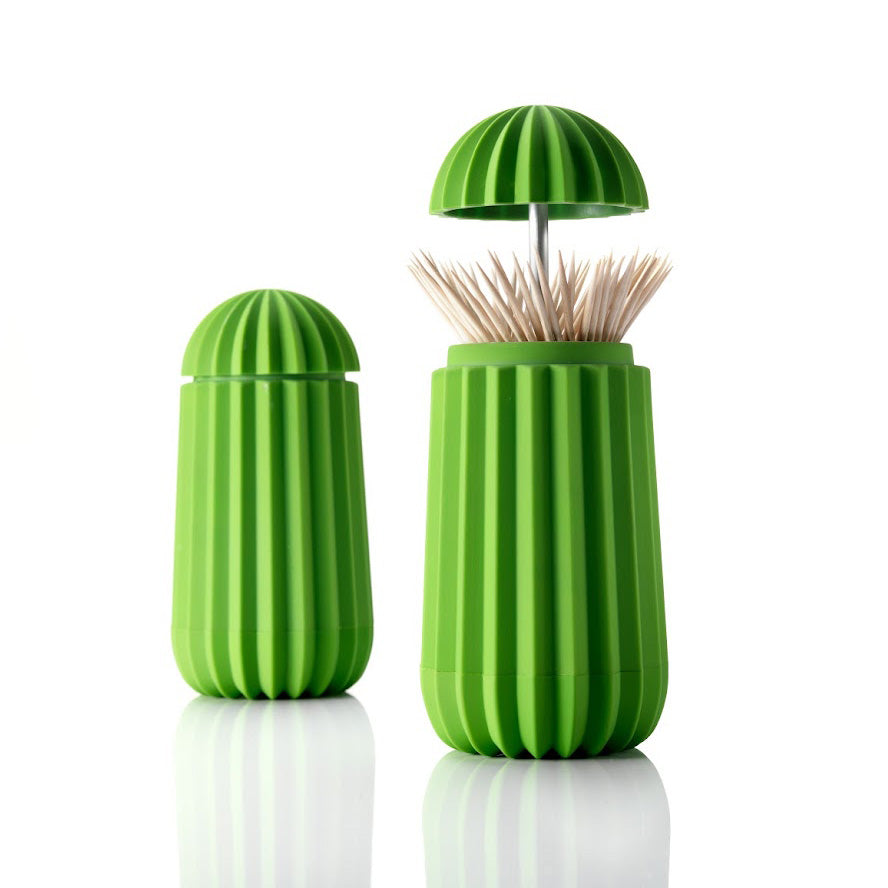 Een houder voor tandenstokers en cocktailprikkers in de vorm van een cactus. Met een druk op de bovenzijde opent deze cactus zich. Je tandenstokers altijd hygiënisch opgeborgen in dit functionele en originele en symbolische ontwerp.