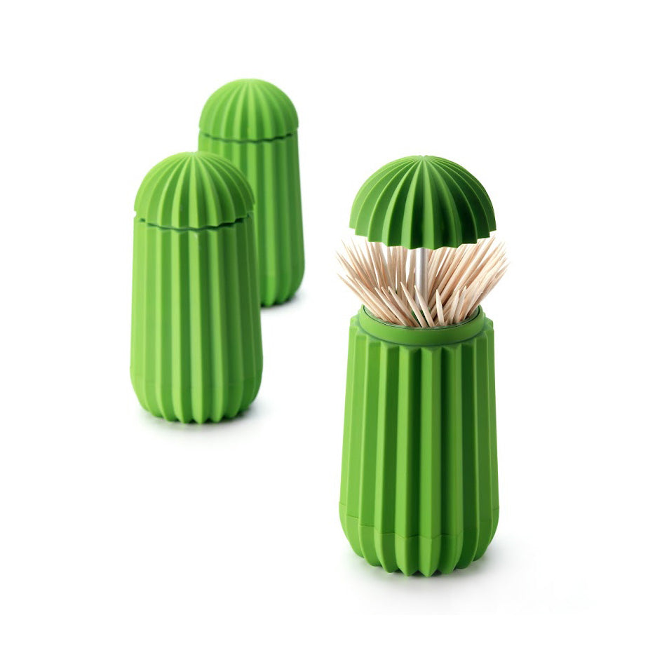 Een houder voor tandenstokers en cocktailprikkers in de vorm van een cactus. Met een druk op de bovenzijde opent deze cactus zich. Je tandenstokers altijd hygiënisch opgeborgen in dit functionele en originele en symbolische ontwerp.