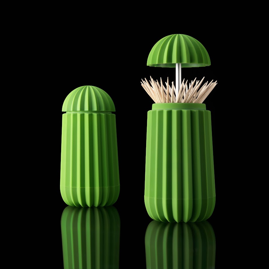 Een houder voor tandenstokers en cocktailprikkers in de vorm van een cactus. Met een druk op de bovenzijde opent deze cactus zich. Je tandenstokers altijd hygiënisch opgeborgen in dit functionele en originele en symbolische ontwerp.