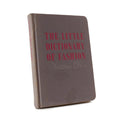 About Blanks notitieboek van de turquoise linnen kaft van The Little Dictionary of Fashion, vooraanzicht schuin