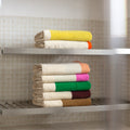 Badhanddoek 70x14 Orange&Honey│Martens&Martens-Suite702│art. MMTT70ORHO│gestapeld in badkamer