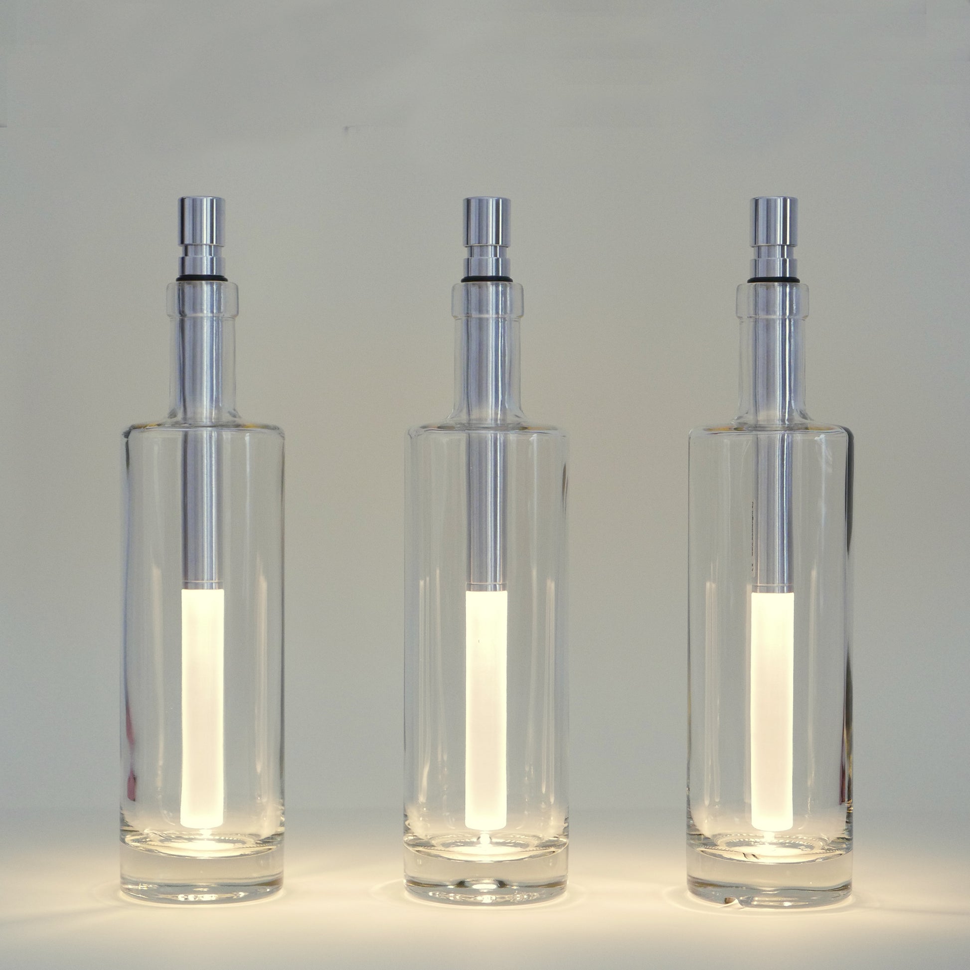 Bottlelight LED Flessenlamp│art. BOT03-W│drie maal in doorzichtige fles met licht aan