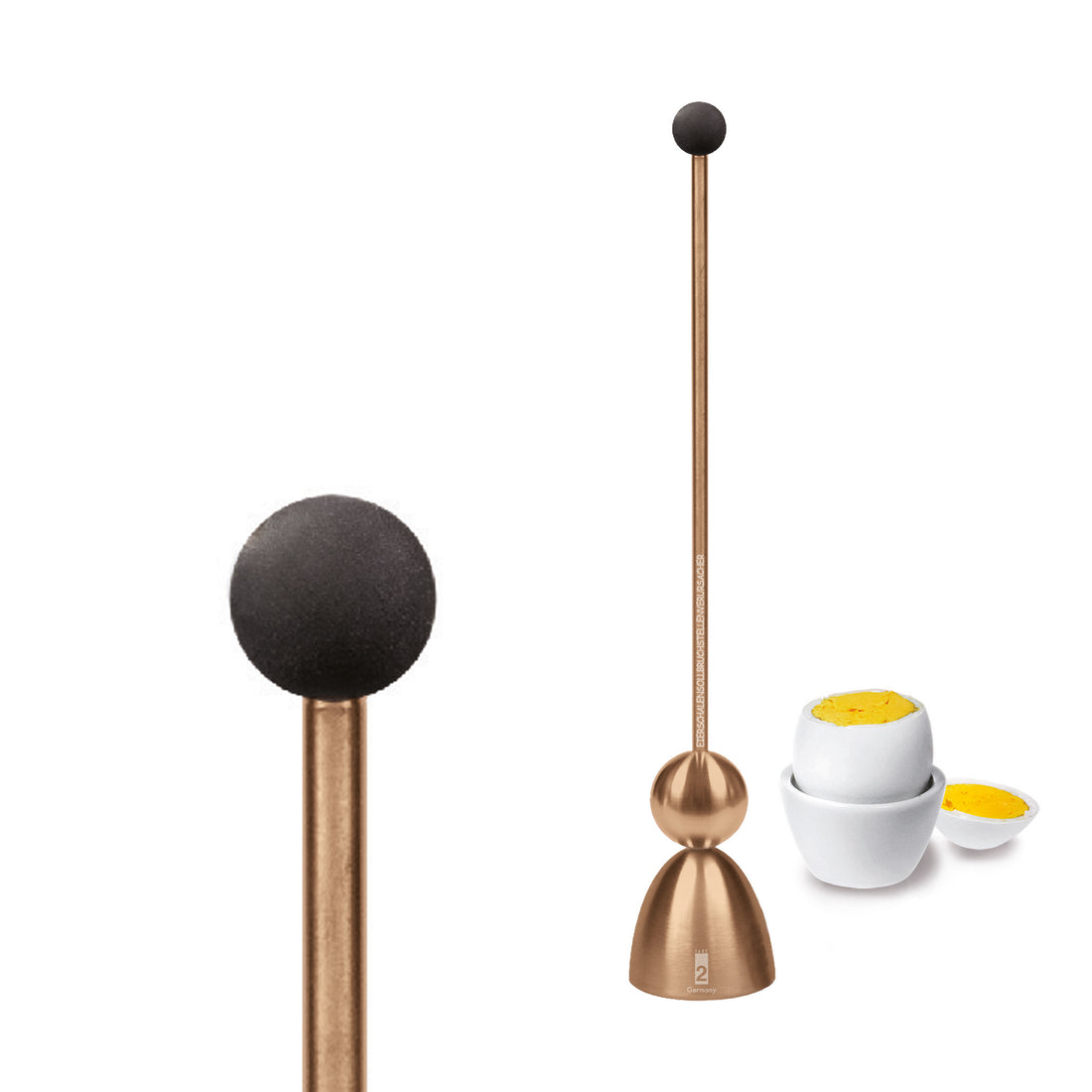 Clack egg topper in rose gold, close up with a boiled egg in an egg cup in the background.