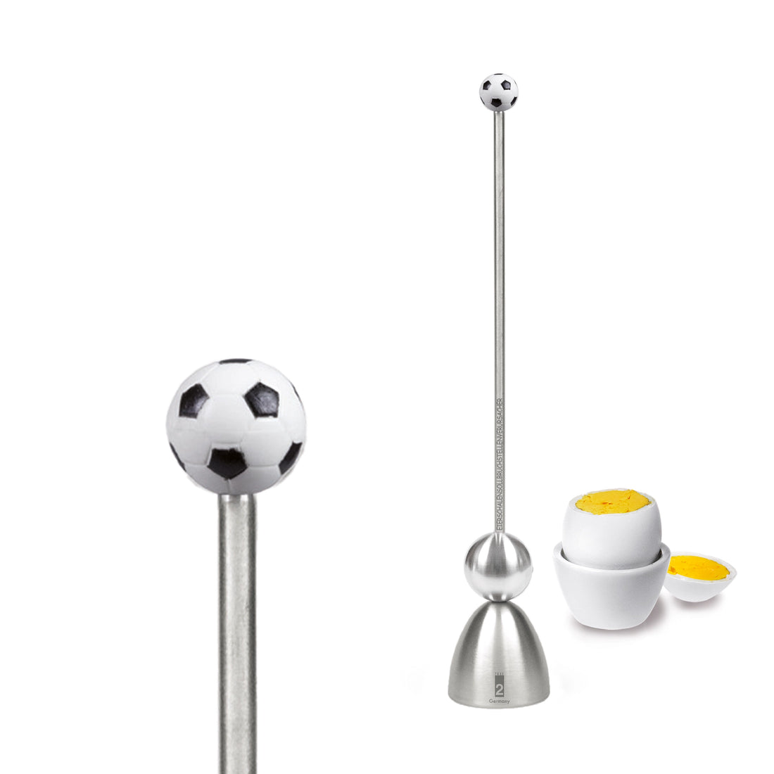 Clack egg topper with a football, close up beside a boiled egg.