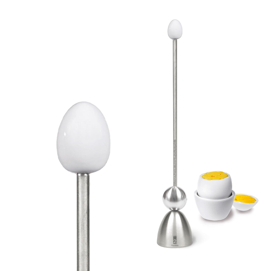 Clack egg topper with a white ceramic egg, close up beside a boiled egg.