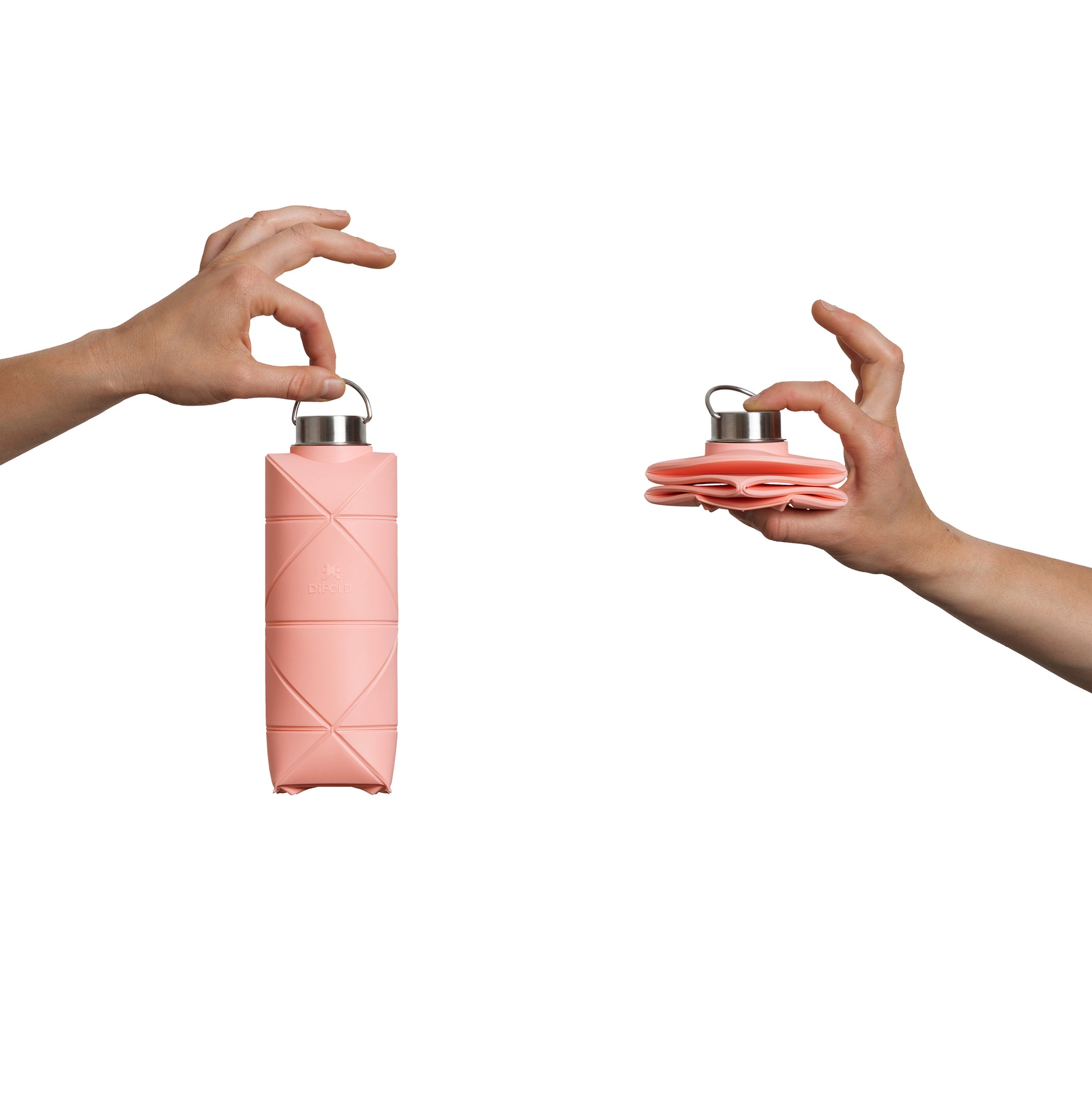 Difold Origami Waterfles Pink Win│art. DFOB25/750PINK│dicht en geopend in handen vastgehouden