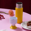 Dopper Insulated Lemon Crush│Thermosfles 580ml Geel│art. 4459│op tafel met losse beker