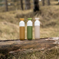 Dopper Original Harvest Sun│Waterfles 450ml Beige│art. 3780│3 kleuren op boomstam in bos