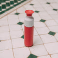 Dopper Insulated Small Deep Coral│Thermosfles 350ml Rood│art. 5272│op tegelvloer