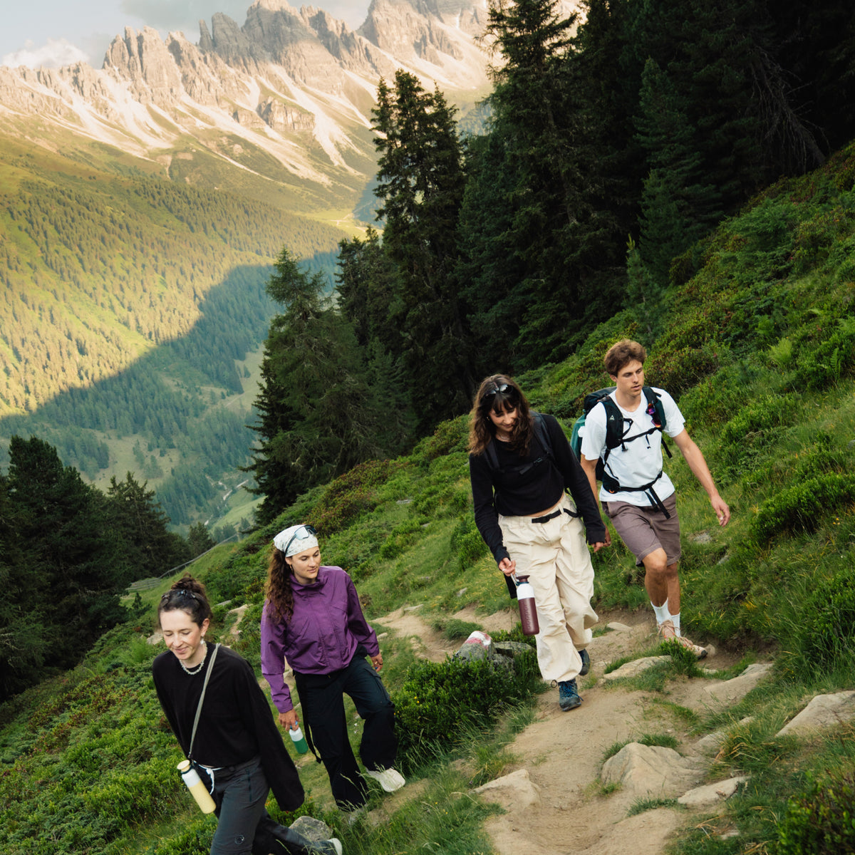 Insulated Bottle 350 ml Maple Yellow (yellow) - group of hikers in the mountains with insulated bottles in various colours