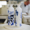 Dopper insulated x Royal Delft│twee thermosflessen in aardewerkfabriek