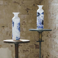 Dopper insulated x Royal Delft│twee modellen op staander in aardewerkfabriek