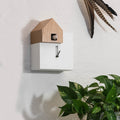 Koekoeksklok Ettore Wit & Eiken│Diamantini & Domeniconi│tegen wand met planten