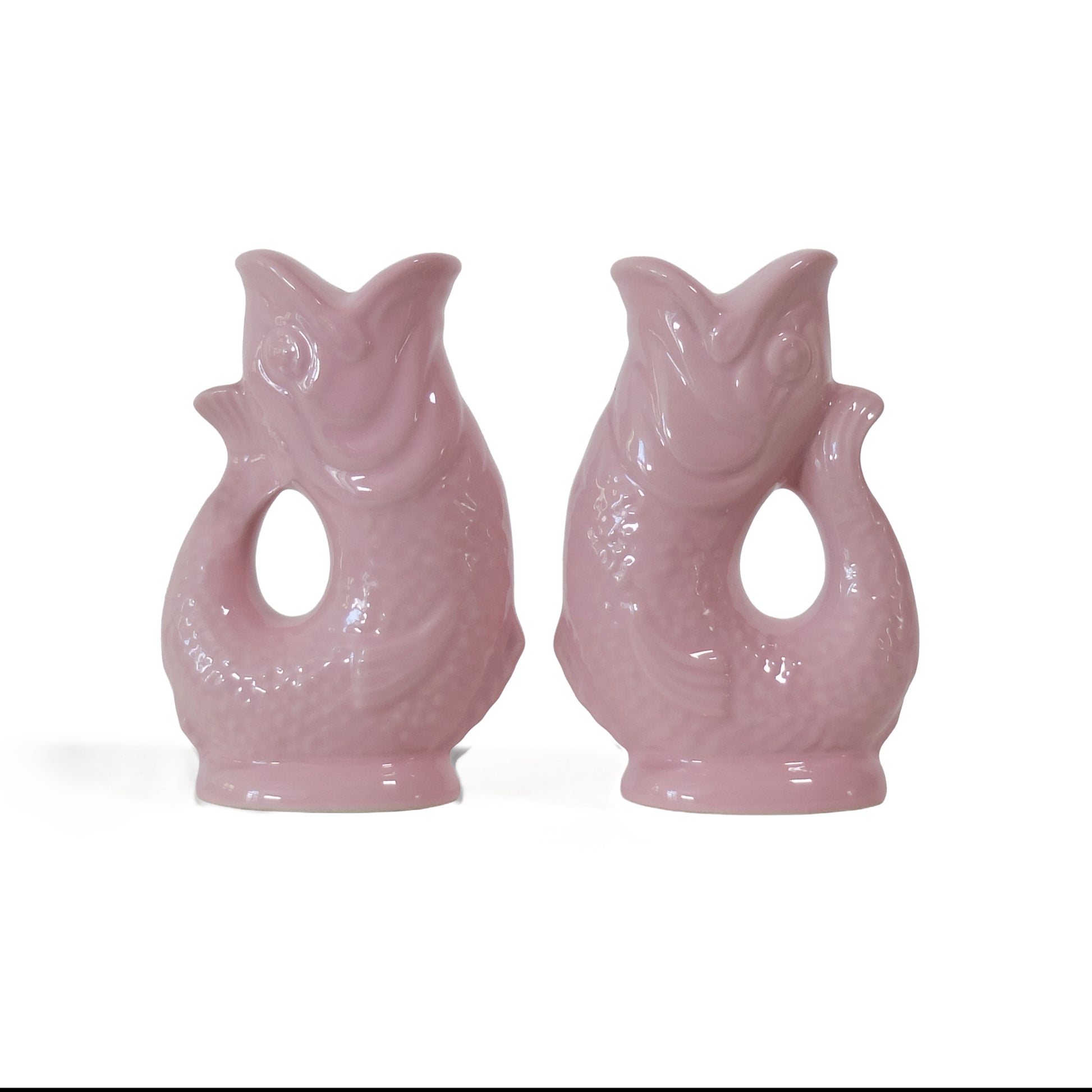 Gluckigluck salt and pepper shakers in pink, the two fish facing each other.