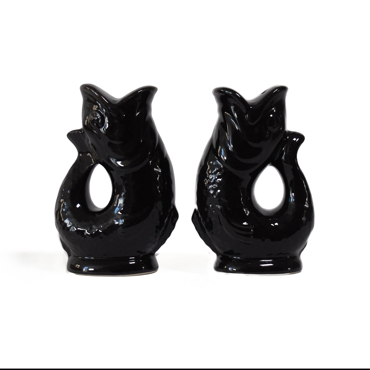 Gluckigluck salt and pepper shakers in black, the two fish facing each other.