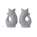 Gluckigluck salt and pepper shakers in Oyster, the two fish facing each other.