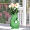 Gluckigluck Waterkaraf Vis Apple│art. G3115/APPL/W│op tafel met witte bloemen