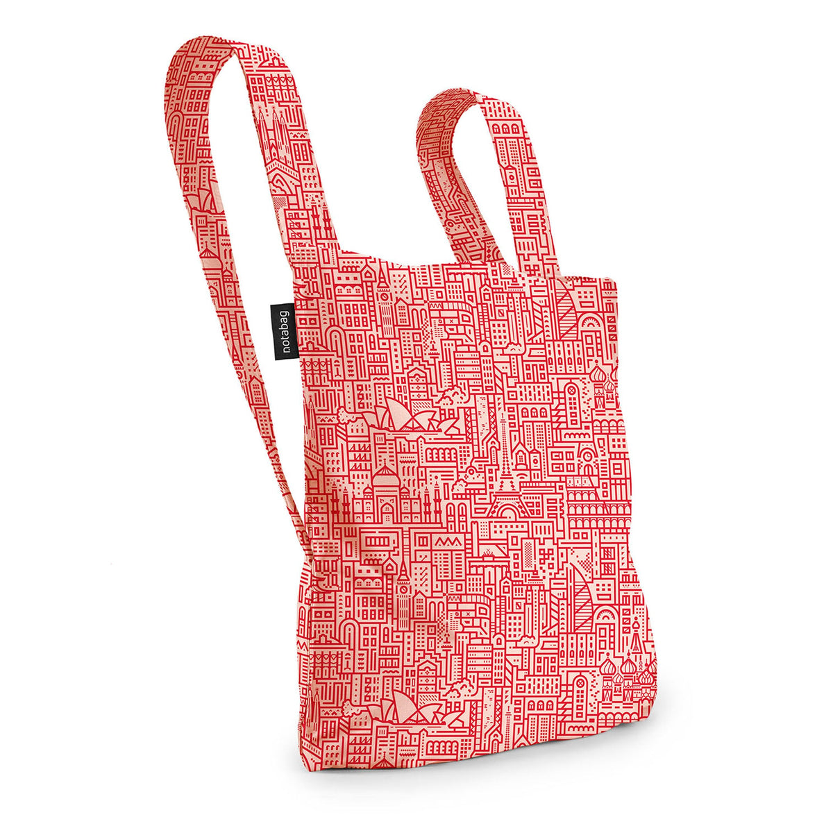 Notabag Hello World Rose Red als rugzak tegen witte achtergrond