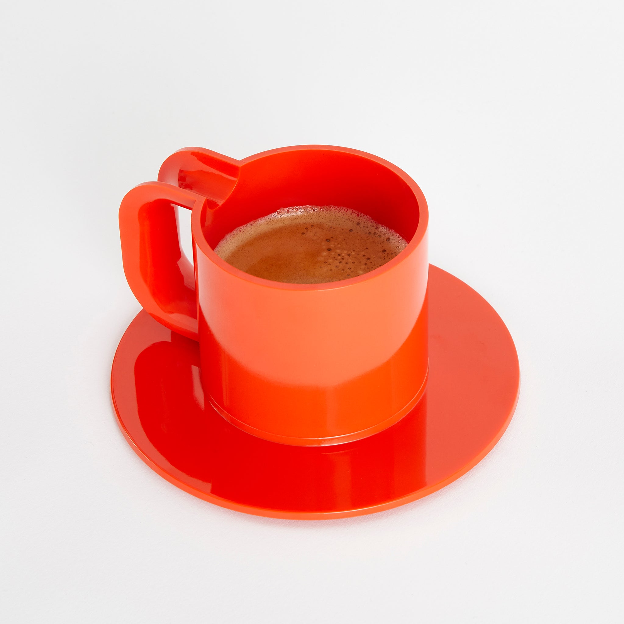 Heller Max Cup&Saucers Oranje│art. 300-07-12│losse kop en schotel met koffie gevuld