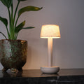 Humble Two Oplaadbare Tafellamp Beige-Beige Linnen│Draadloos│art. HUMTL00214│op marmeren bald naast plant