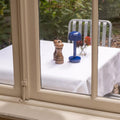 Humble Two Oplaadbare Tafellamp Cobalt Blue│op buitentafel vanuit raam│art. HUMTL00219