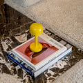 Humble Two Oplaadbare Tafellamp Yellow│bovenaanzicht op boeken│art. HUMTL00217