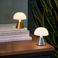Lexon Mina Small Metallic Gold│Oplaadbare LED-lamp│art. LH60MC│met Gold samen op kastje